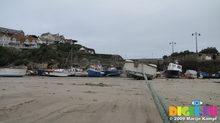 SX08691 Small boats on sand in Newquay harbour
